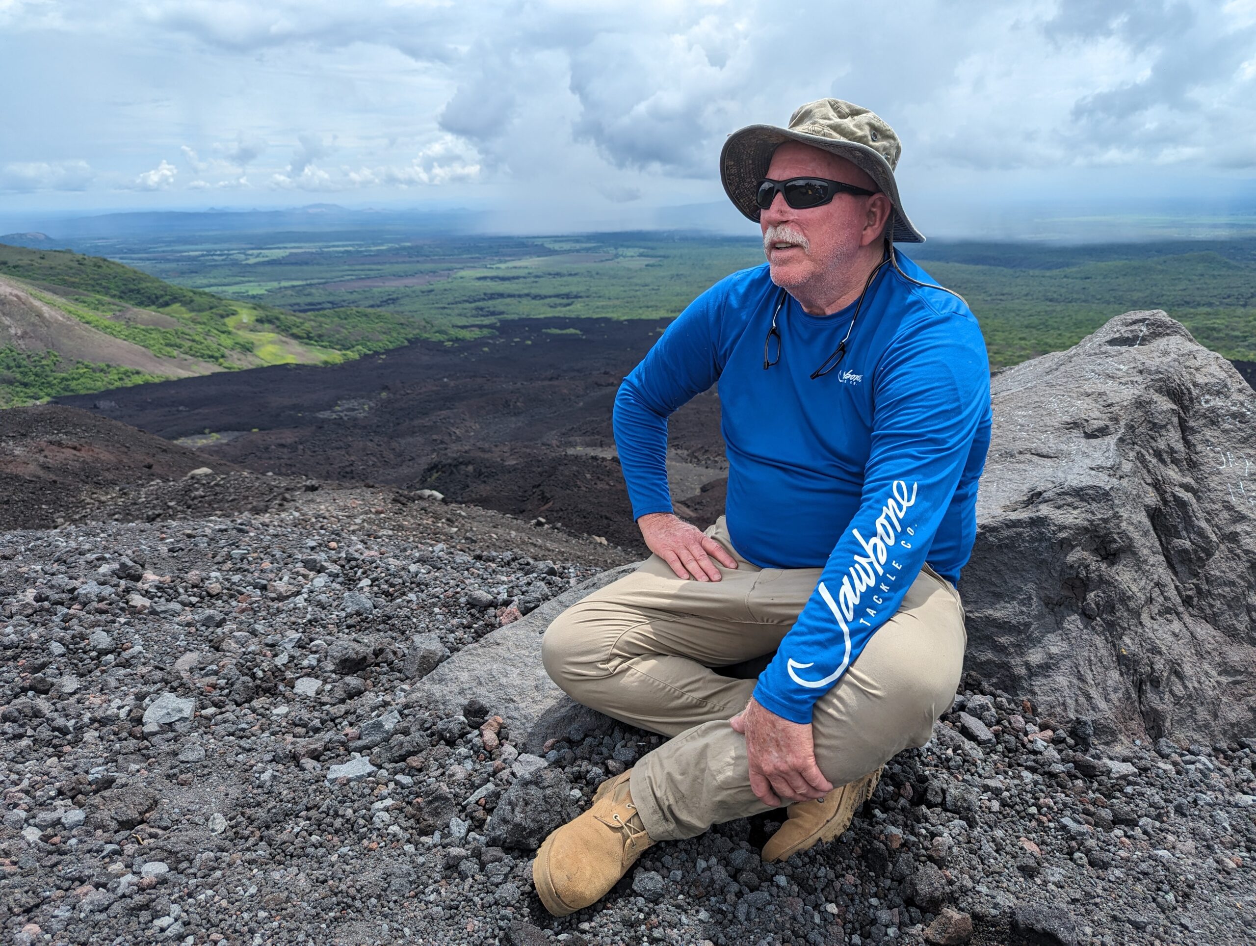 Ron Sitting on Volcano Ron Howard takes a brake while climbing Cerro Negro in Nicaragua