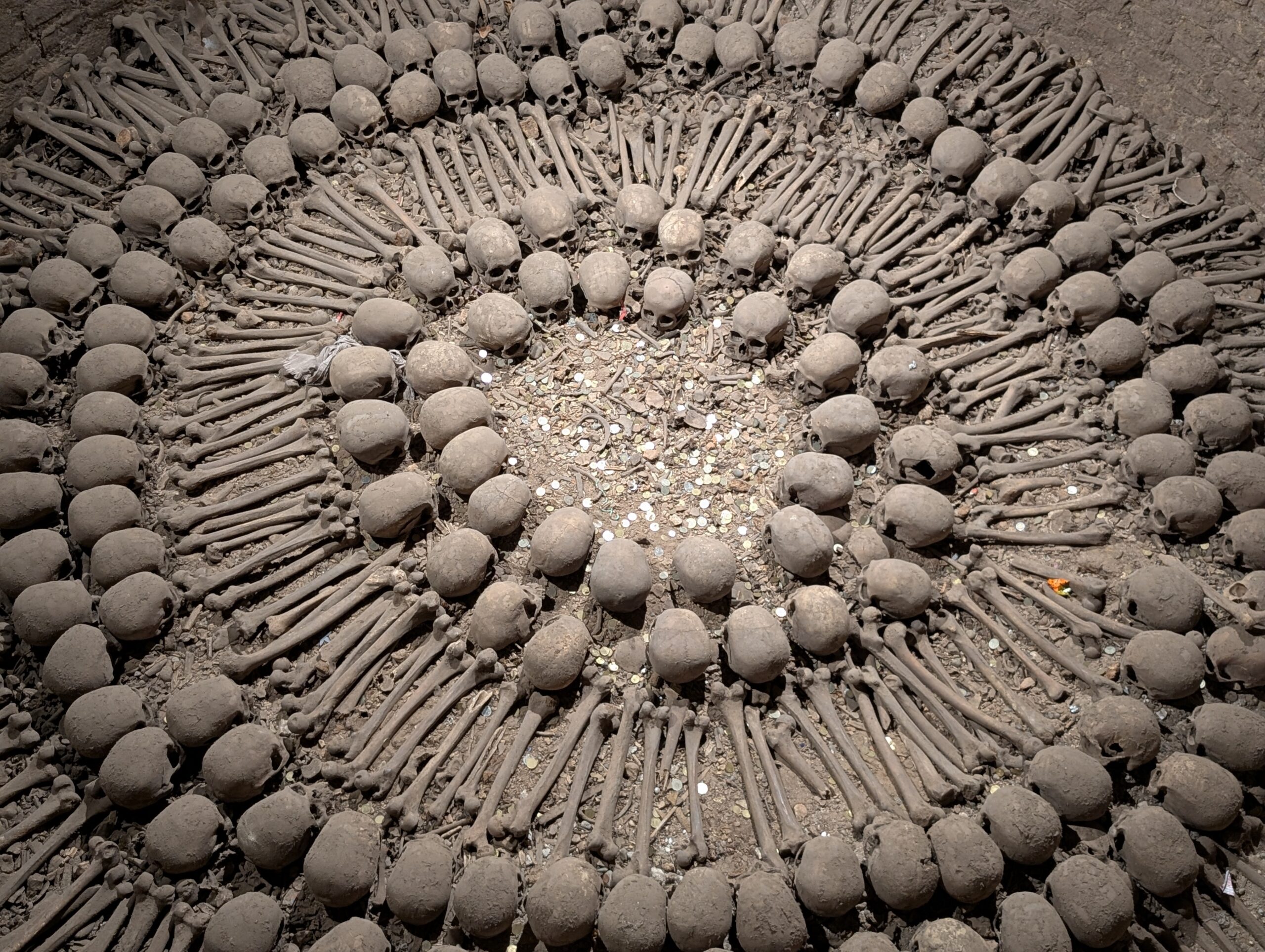 Lima Catacombs skull circle with bones arranged in circular pattern under San Francisco Church Lima Peru